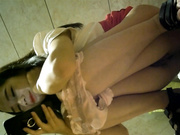 KTV夜场厕所偷拍.极品长腿女神,包臀齐B裙,看着手机傻笑